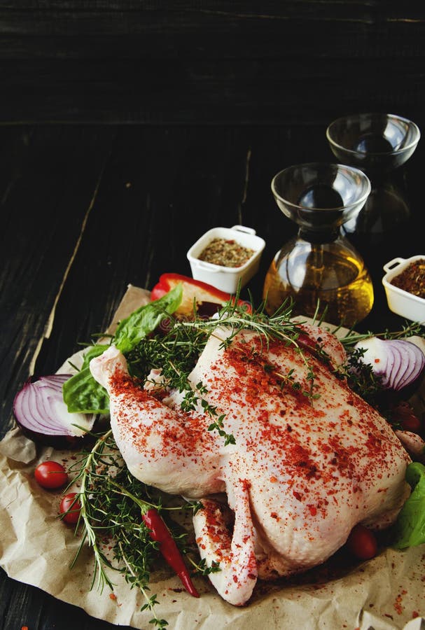 Raw Chicken with Herbs Spices Ingredients, Selective Focus Stock Photo