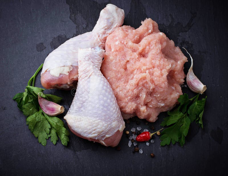 Raw Chicken Legs and Minced Meat Stock Photo Image of fowl, cooking