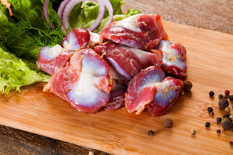 Raw chicken stomach stock image. Image of neck, shop 112512697