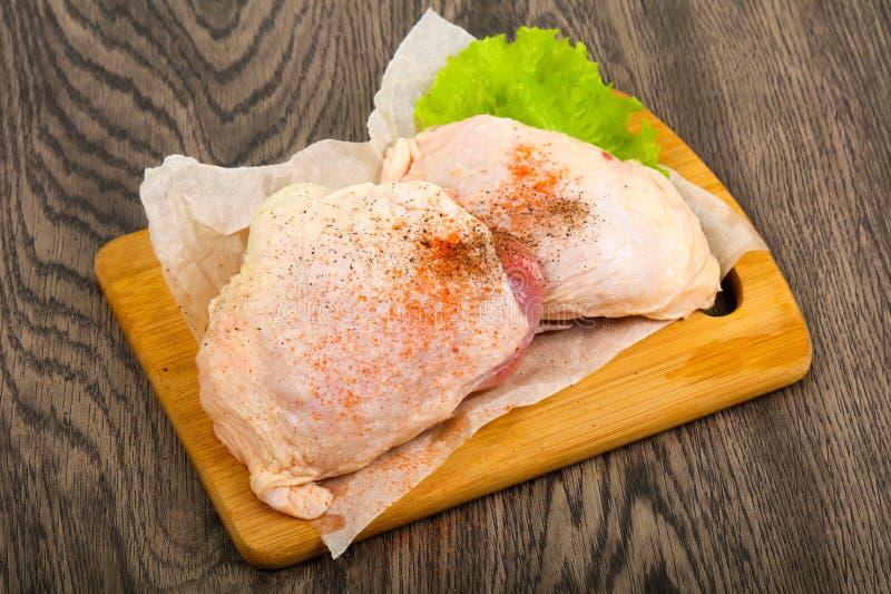 Raw chicken thigh stock photo. Image of cooking, closeup 136764084