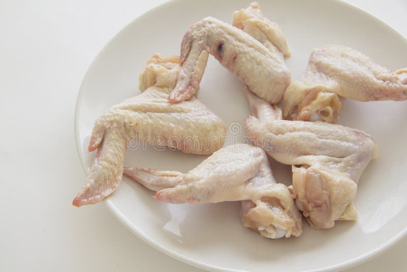 Raw chicken wings stock photo. Image of bone, four, group 51991534