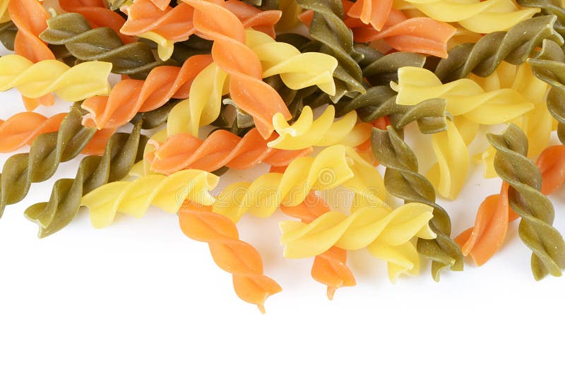 Raw colored pasta fusilli