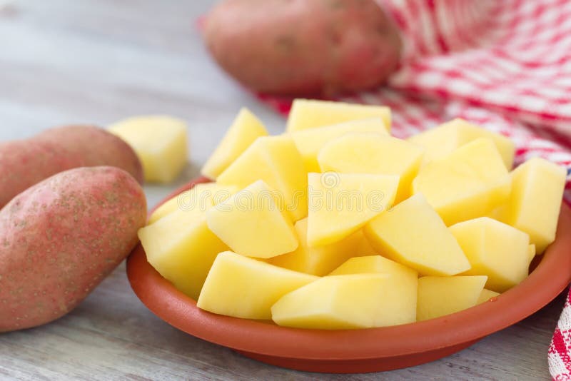 Raw cutted potatoes stock photo. Image of kitchen, cook 63881750