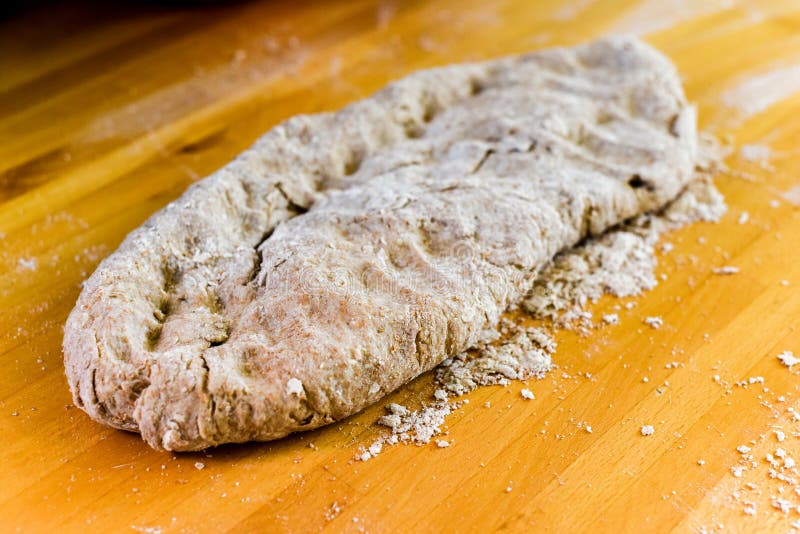 Raw Dough and Flour Ingredients To Make a Loaf of Bread at Home Stock