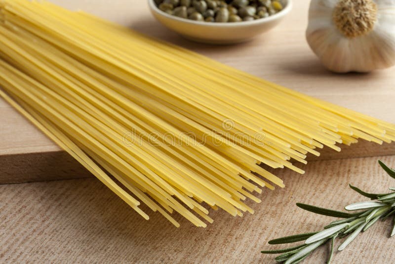 Raw dried spaghetti stock image. Image of yellow, traditional 52504347