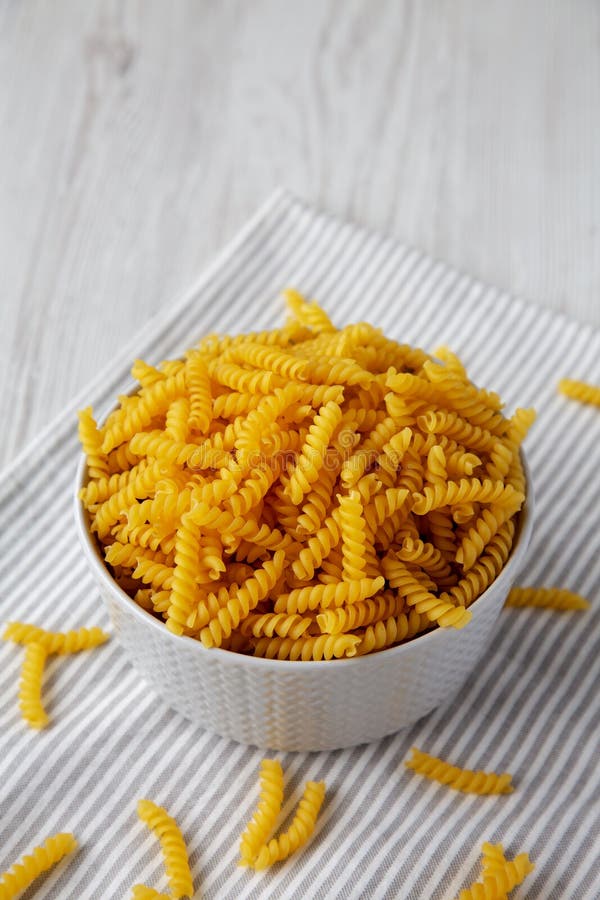 Raw Dry Organic Rotini Pasta Ready To Cook, Side View Stock Image