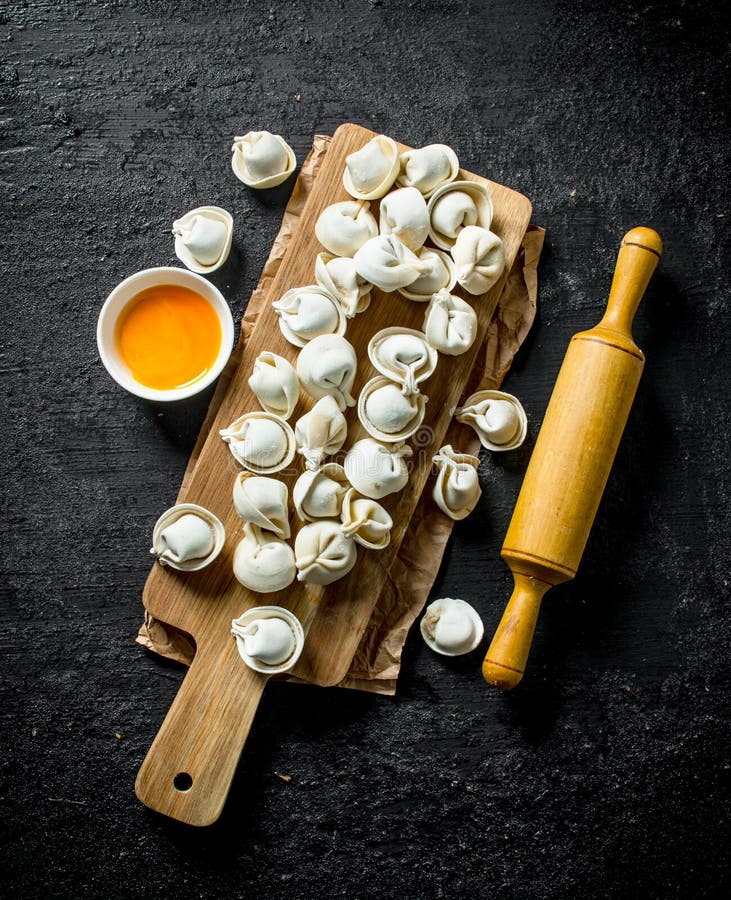 Raw Dumpling with Rolling Pin and Egg Yolk Stock Image Image of