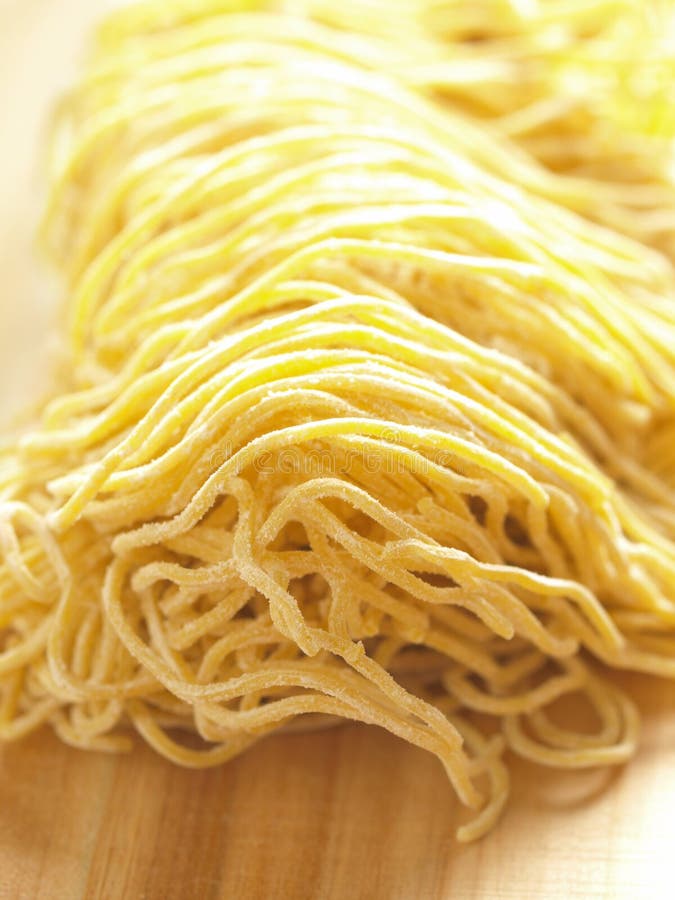Raw egg noodles stock image. Image of asian, yellow, traditional 15591917