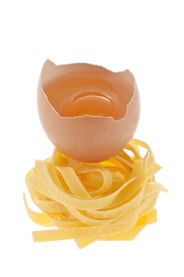 Raw egg and pasta. stock photo. Image of studio, orange 10738288