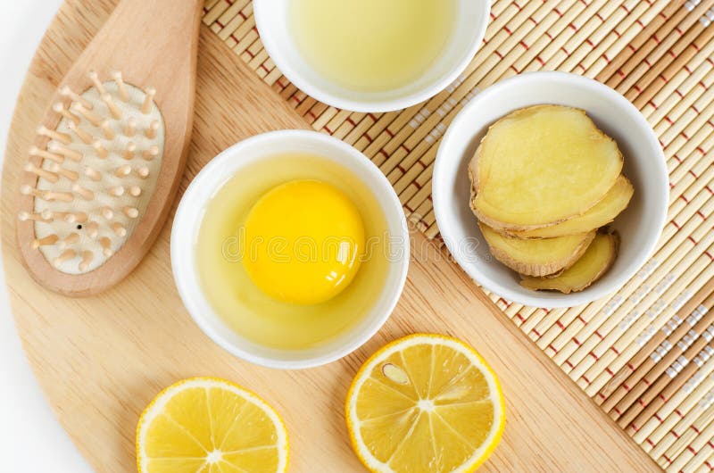 Raw Egg in the Small White Bowl, Wooden Hair Brush, Lemon, Lemon Juice and  Ginger Slices. Natural Homemade Hair Treatment Stock Photo - Image of face,  product: 178056538