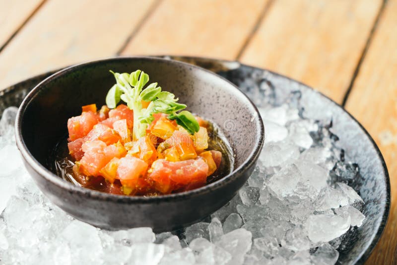 Raw and fresh tuna tartare stock image. Image of arugula 98449953
