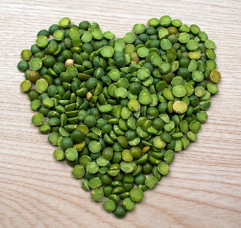 Green Split Peas Formed into the Shape of a Heart Stock Photo Image
