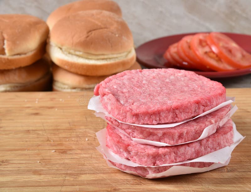 Raw hamburger patties stock image. Image of dinner, bread 152444967