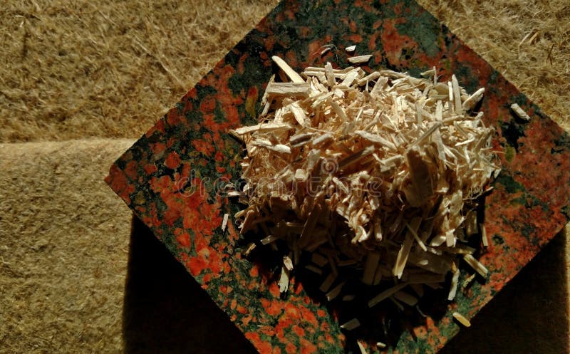 Raw Hemp Shiv served on Raw Hemp Fiber stock photography