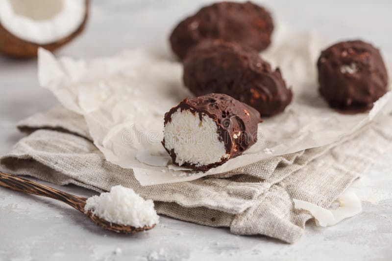 Raw homemade vegan chocolate coconut candy bounty, white backgro royalty free stock photos Raw homemade vegan chocolate coconut candy bounty, white backgro royalty free stock photos