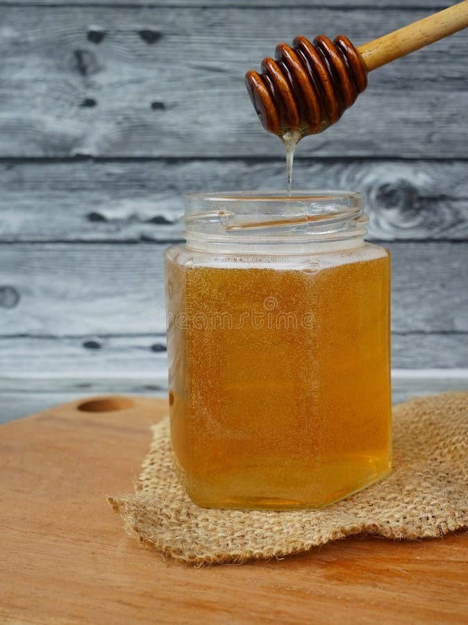 Raw Honey from Rosewood Flowers Nectar with Dipper Stock Image Image