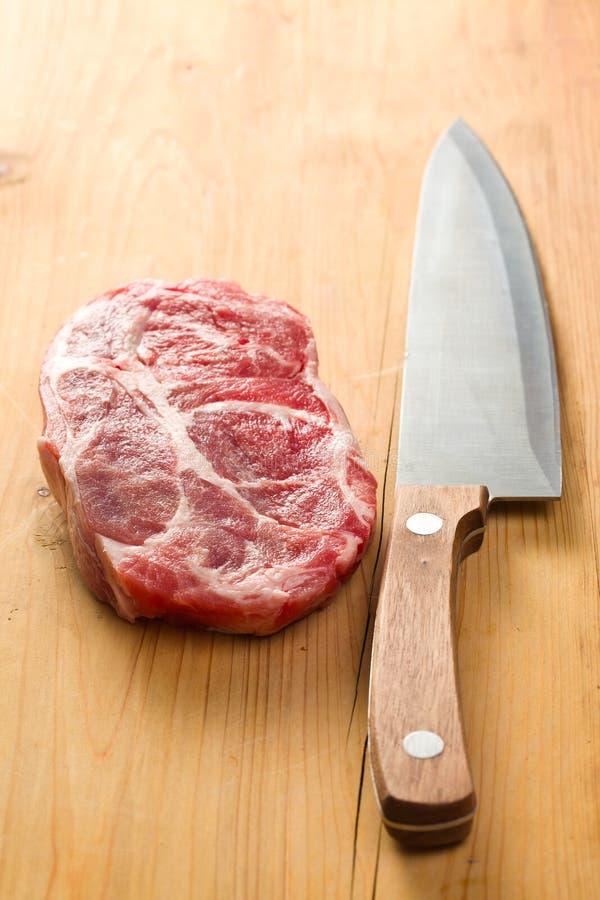 Raw juicy meat with knife stock image. Image of food 18392917