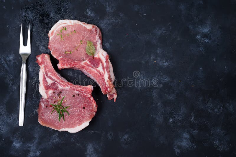 Raw Lamb Ribs on rustic black background. Top View royalty free stock photos Raw Lamb Ribs on rustic black background. Top View royalty free stock photos