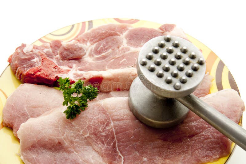 Raw meat with hammer