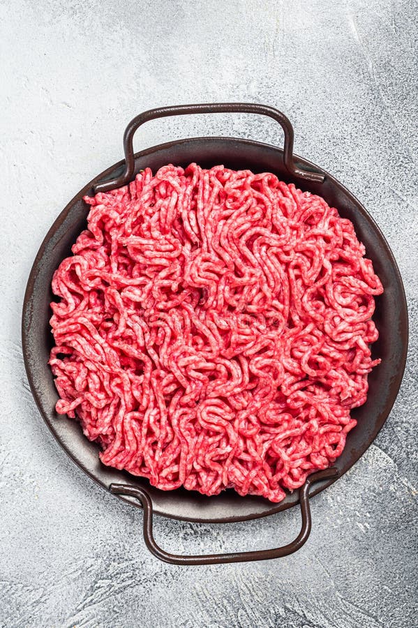 Raw Mince Ground Meat in a Kitchen Tray. White Background Stock Image