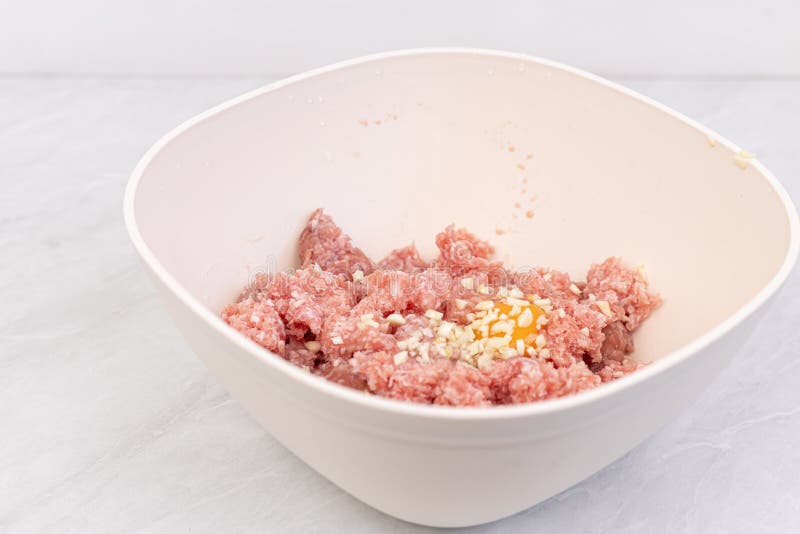 Raw Minced Meat with Smashed Eggs and Chopped Onion Mixture for