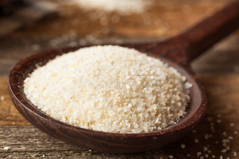 Raw Organic Dry Grits stock photo. Image of cornmeal 66537420