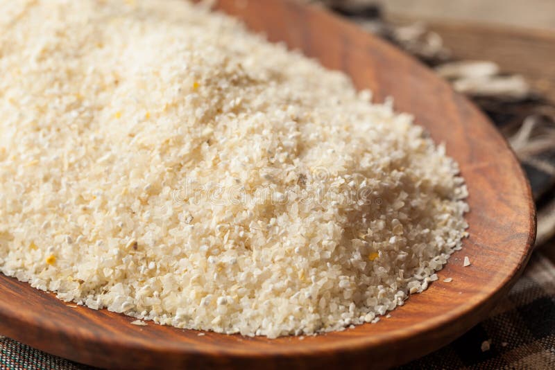 Raw Organic Dry Grits stock photo. Image of cornmeal 66537420