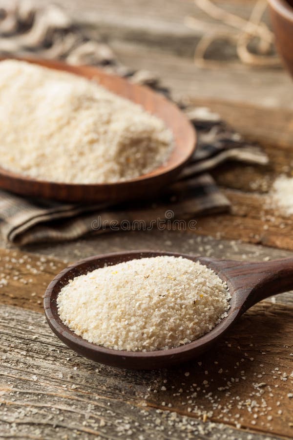 Raw Organic Dry Grits stock image. Image of spoon, ground 66537373