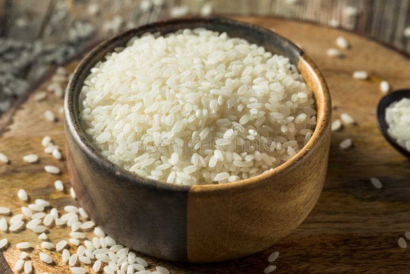 Raw Organic Dry White Rice stock image. Image of carbohydrate 181668193