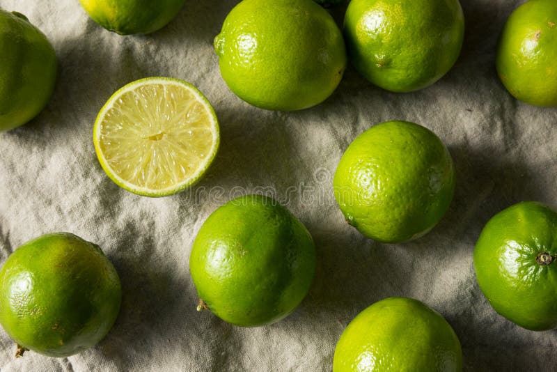 Raw Organic Green Limes stock image. Image of juice 183325241