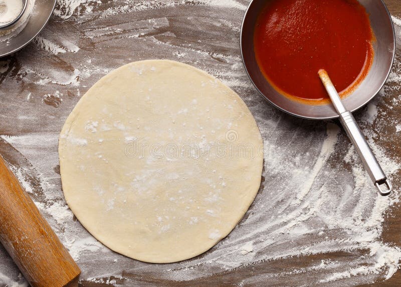 Raw Pizza Base and Ketchup. Rolled Out Dough Stock Image Image of
