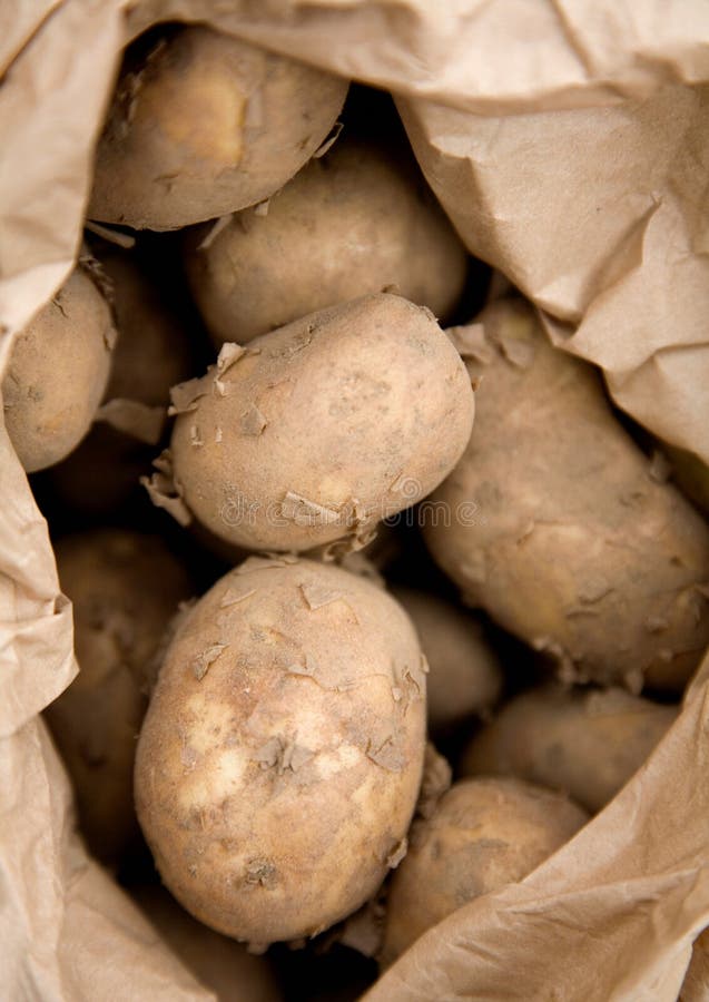 Raw Potatoes in Brown Paper Bag Stock Photo Image of food, closeup