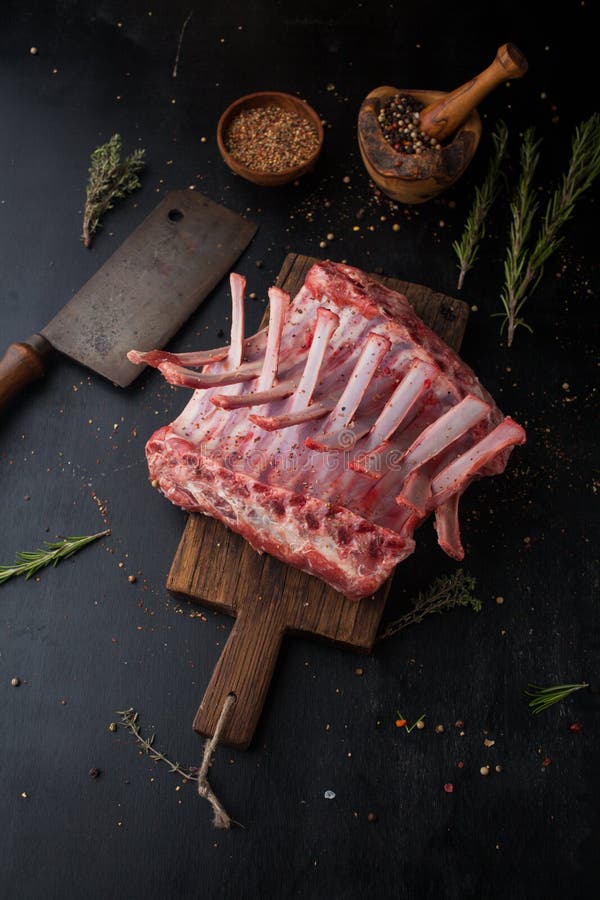 Raw Rack of Lamb with Spices on a Cutting Board Stock Image Image of wooden, pepper 95038983