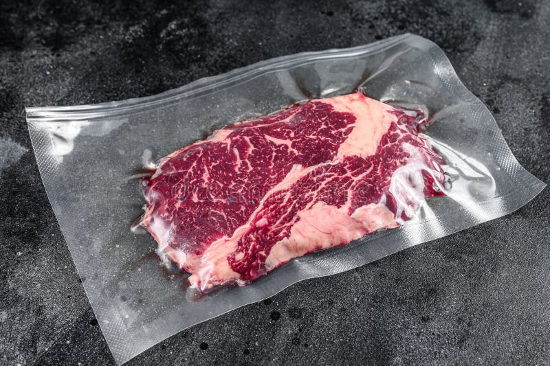 Raw Rib Eye Beef Meat Steak in Vacuum Packaging. Black Background Stock Image Image of ribeye