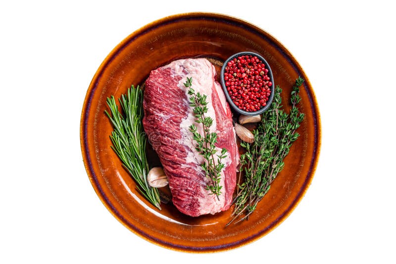 Raw Round Beef Meat Prime Cut for Roast on a Rustic Plate with Herbs