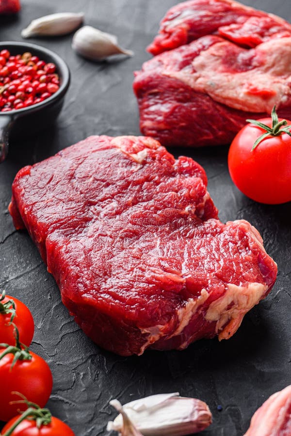 Raw Rump Beef Steak Cuts, with Herbs, Seasoning on Black Table, Side View Stock Photo Image of