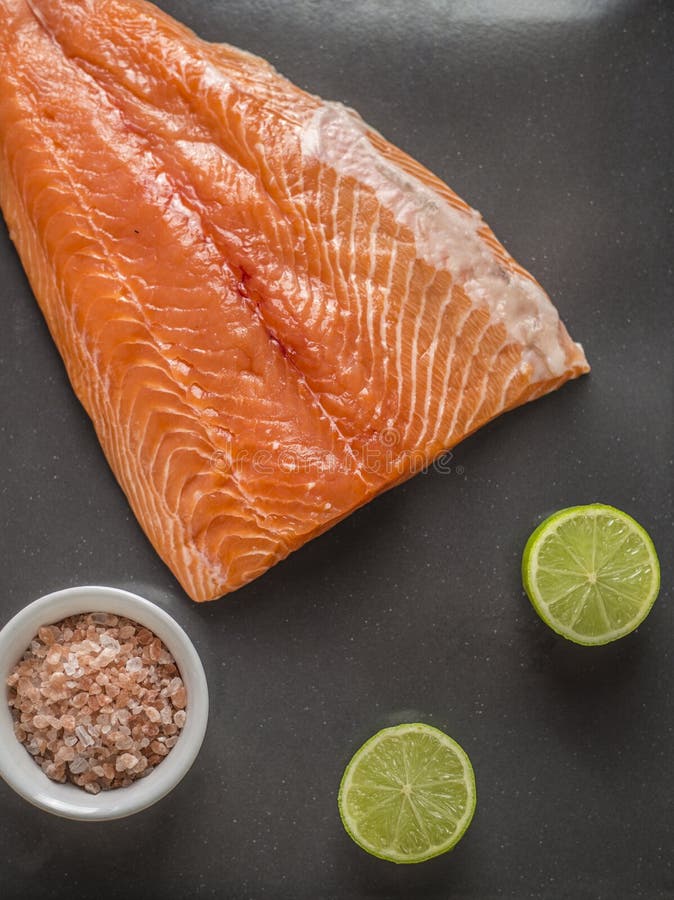 Raw Salmon Fillets on Dark Background Stock Photo - Image of fillet ...