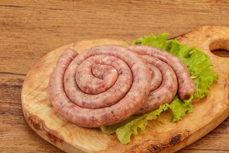 Raw sausage ring for grill stock photo. Image of traditional 192163028