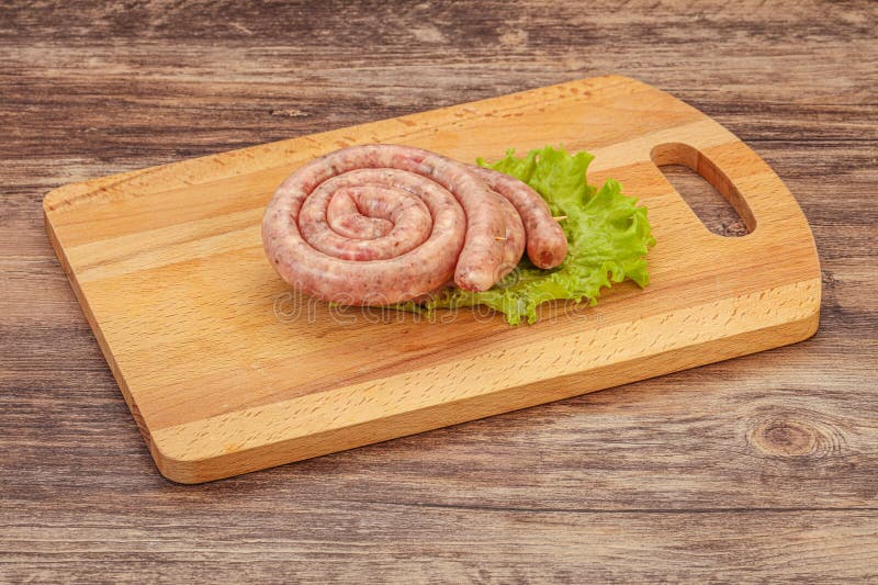 Raw sausage ring for grill stock photo. Image of ring 192228098