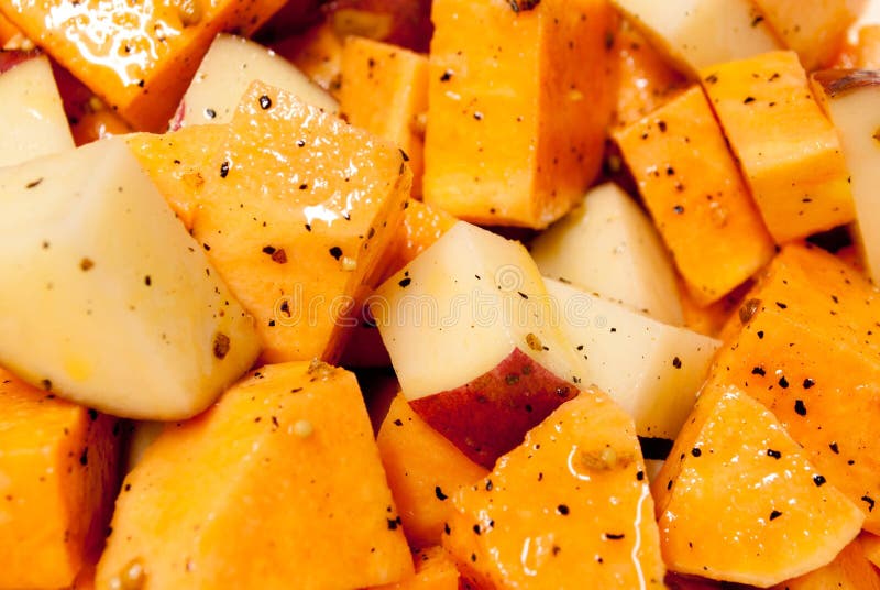 Raw Seasoned Potato Cubes stock photo. Image of cubed 22656888