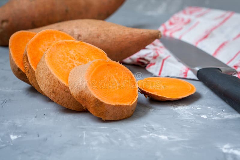 Raw Sliced and Whole Sweet Potatoes Stock Photo Image of grocery