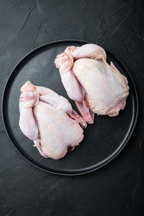 Raw Small Young Chicken, on Black Background Stock Photo - Image of ...