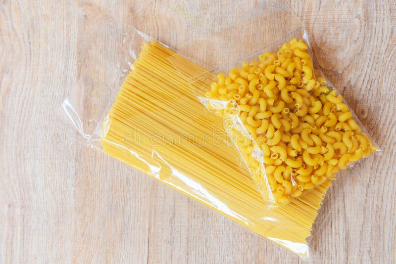 Raw spaghetti italian pasta uncooked raw Macaroni in package vermicelli pasta product dry food , non perishable food