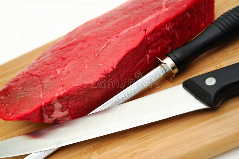 Raw Steak an Knife stock photo. Image of food, white 11615638
