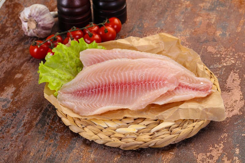 Raw tilapia fish stock image. Image of gourmet, kitchen 150663737