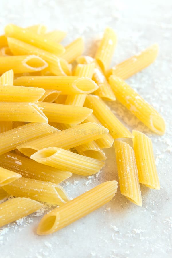 Uncooked raw penne pasta stock image. Image of diet, healthy 84594075