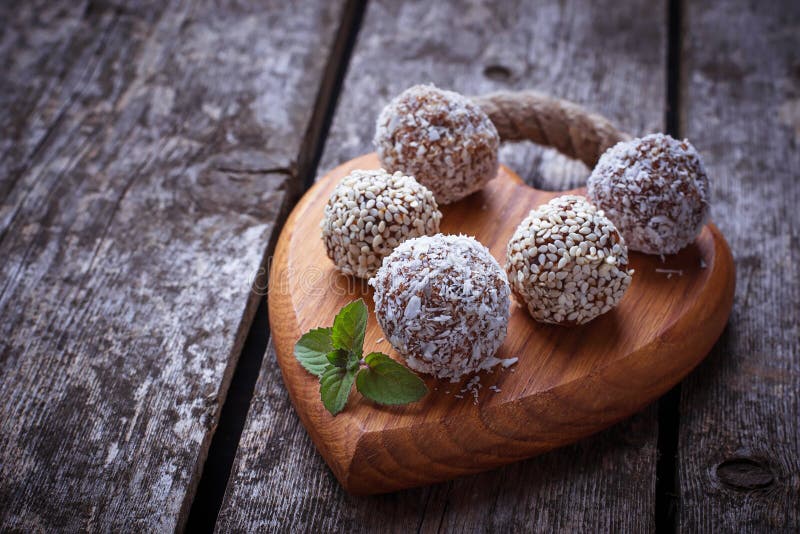 Raw vegan candies c with dried fruit and coconut royalty free stock photos Raw vegan candies c with dried fruit and coconut royalty free stock photos