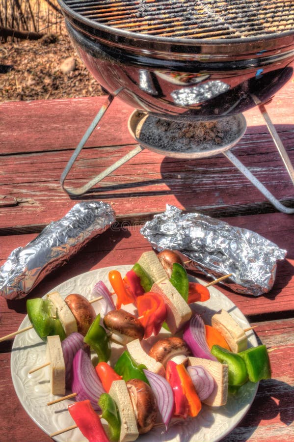 Raw Vegetables and Tofu are Prepared for Kabobs and Grilled on a