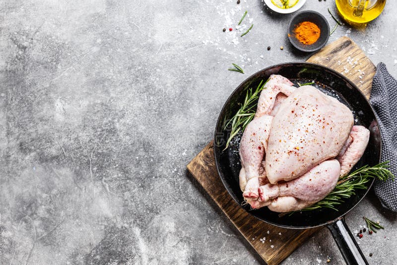 A Whole Raw Chicken Carcass on a White Plate Stock Image Image of