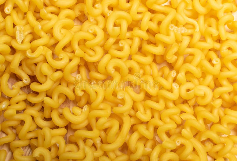 Download Raw Yellow Cavatappi Pasta Isolated On White Background Stock Image Image Of White Bowl 164445513 PSD Mockup Templates